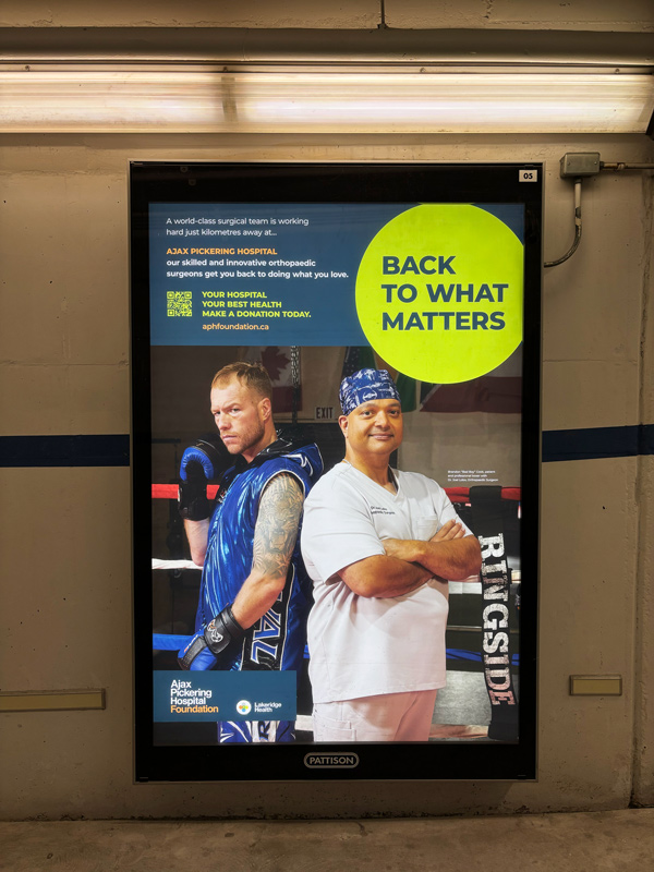 Back to What Matters campaign backlit poster at GO Train Station